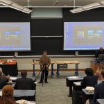 Rich Bauernschub, lecturer in mechanical engineering and lead instructor for the Senior Design course, gives the opening remarks at the Fall Design Day event.